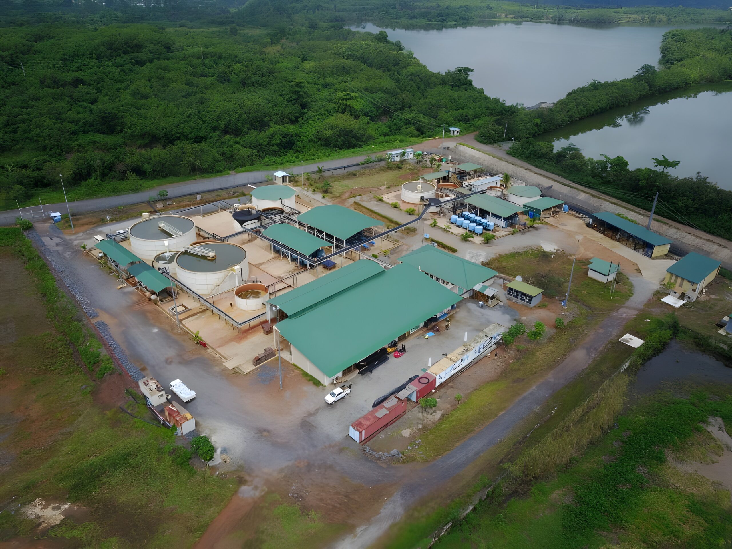 Aerial photograph of a water treatment plant in a tropical landscape