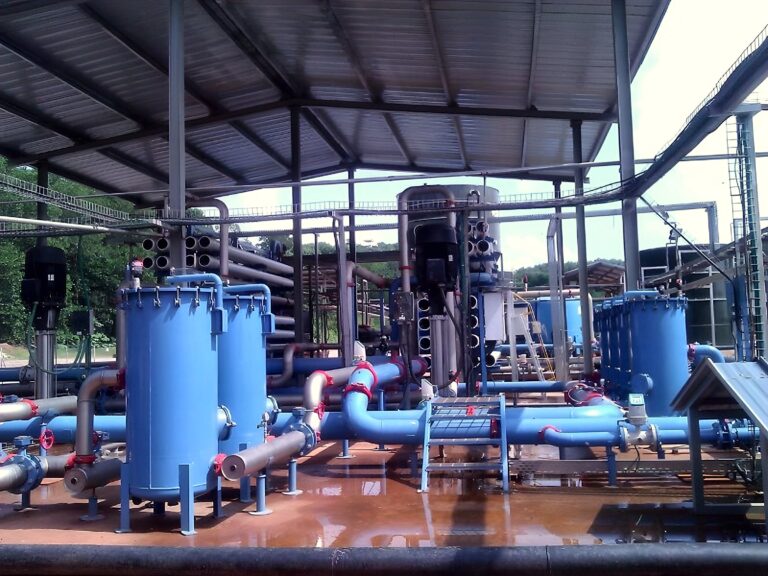 Filter vessels and blue process piping at a treatment plant